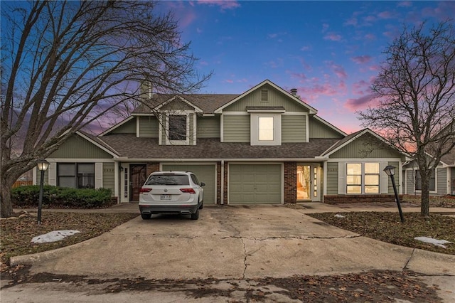 view of front of property featuring a garage