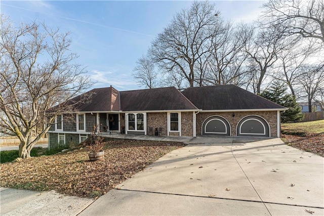 single story home with a garage