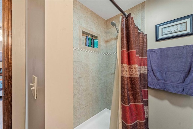 bathroom featuring walk in shower