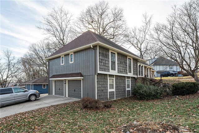 view of property exterior featuring a garage