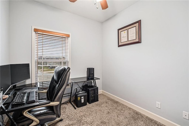 carpeted home office with ceiling fan