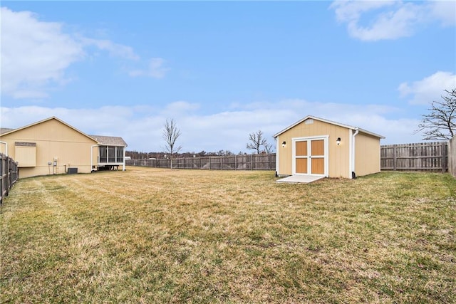 view of yard featuring a storage unit