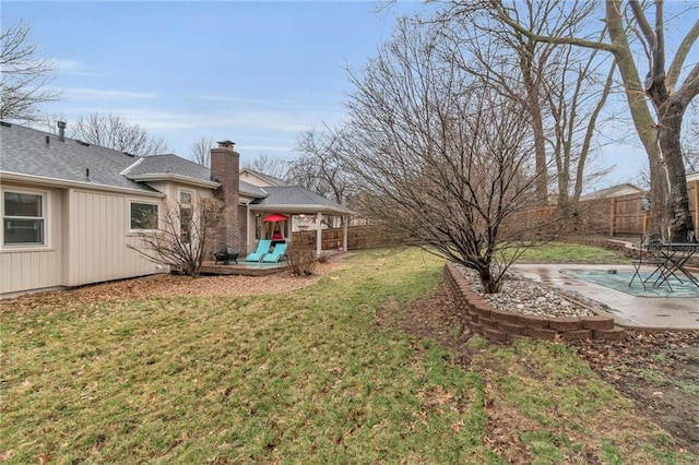 view of yard featuring a patio area and a fenced backyard