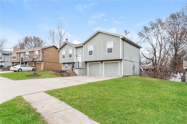 view of front of house featuring a garage and a front yard