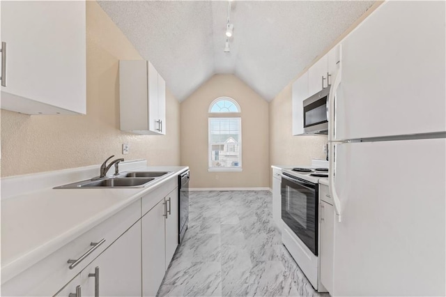 kitchen featuring white cabinetry, lofted ceiling, sink, white appliances, and a textured ceiling