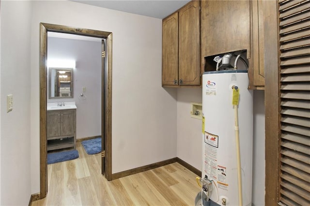 utilities featuring water heater and sink