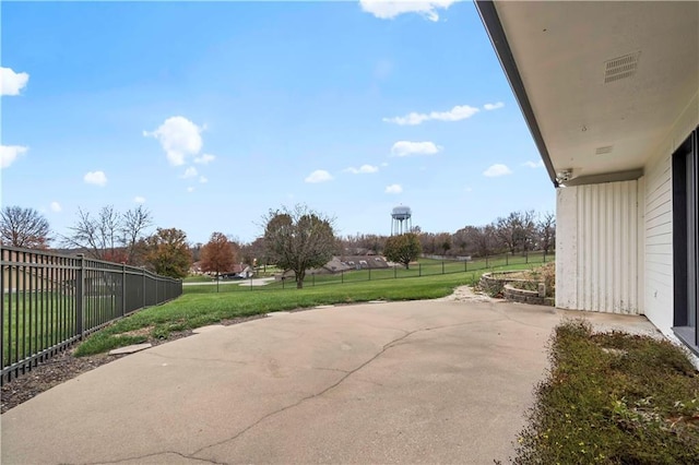 view of patio / terrace with fence and visible vents