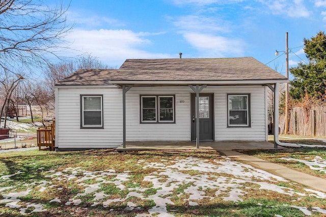 bungalow-style house featuring covered porch