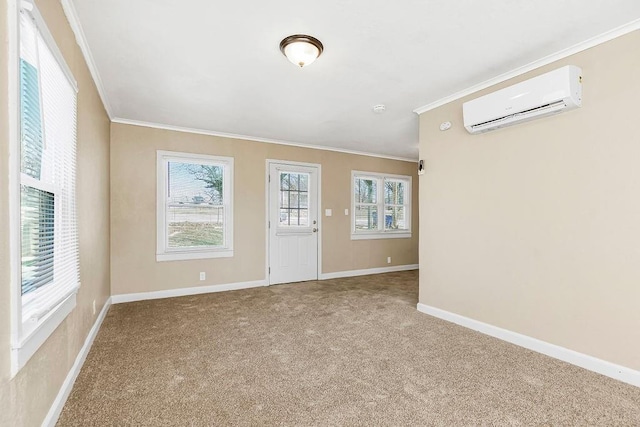 interior space featuring crown molding, a wall mounted AC, and carpet flooring