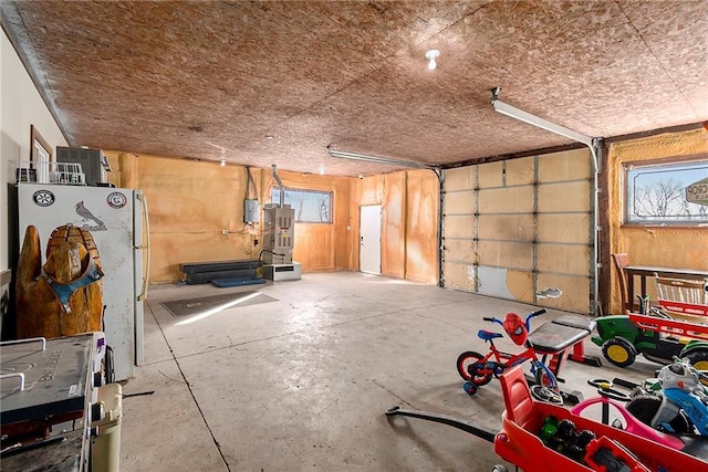 garage featuring white refrigerator