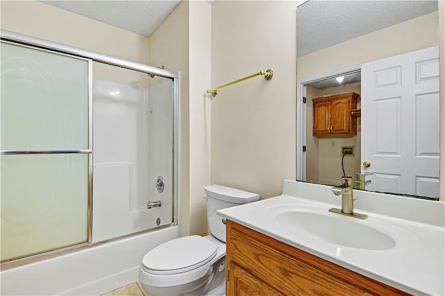 full bathroom with enclosed tub / shower combo, vanity, a textured ceiling, and toilet