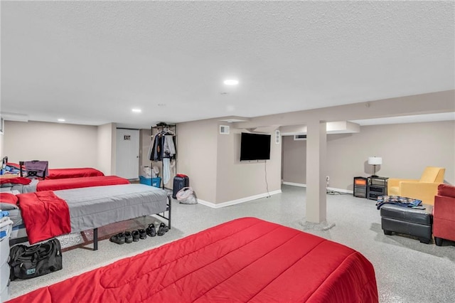 bedroom featuring a textured ceiling