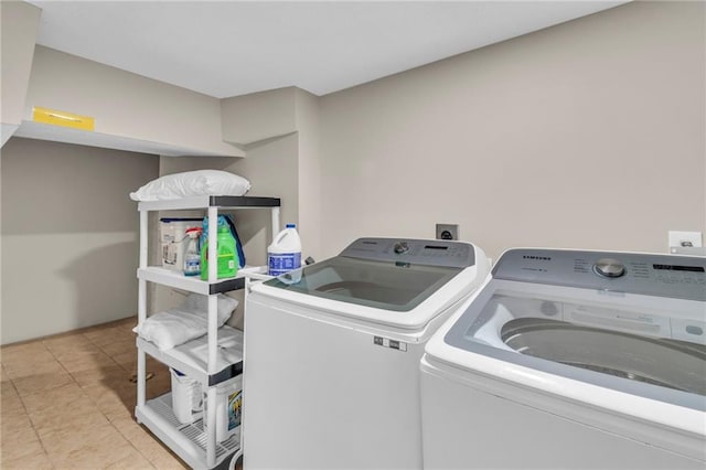 laundry room featuring washer and clothes dryer