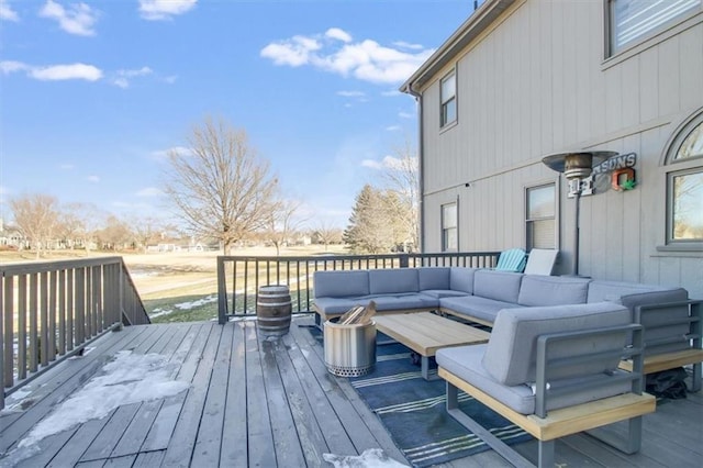 deck featuring outdoor lounge area