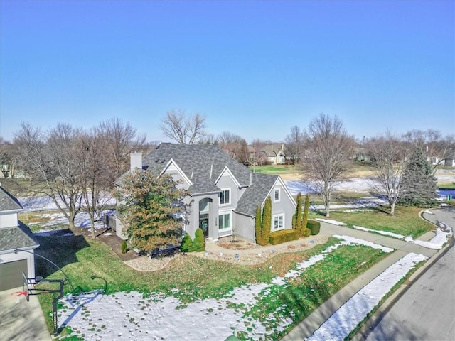 view of front of property with a front lawn