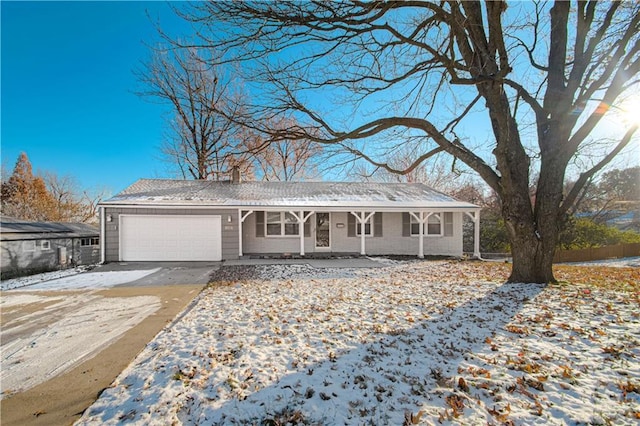 ranch-style home featuring a garage