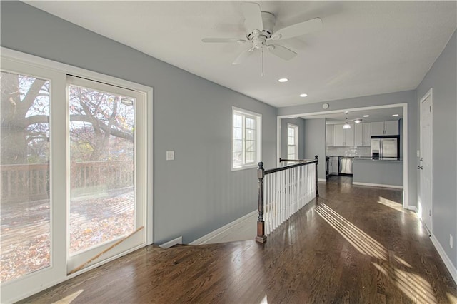 hallway featuring dark hardwood / wood-style floors