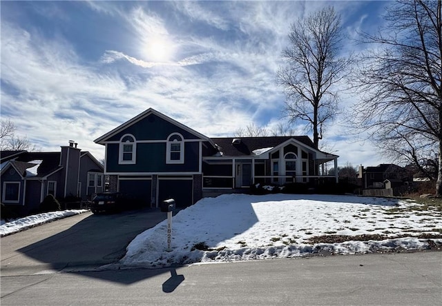 view of front of home with a garage