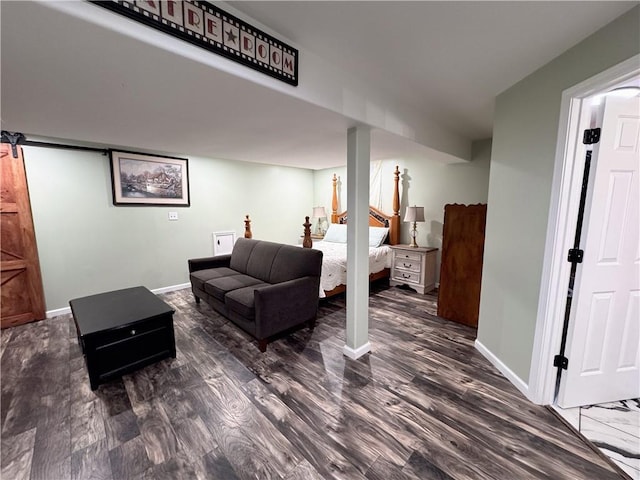 bedroom featuring dark hardwood / wood-style flooring