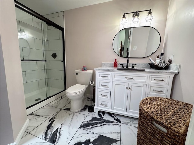 bathroom featuring vanity, toilet, and walk in shower