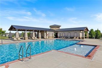 pool with a patio area