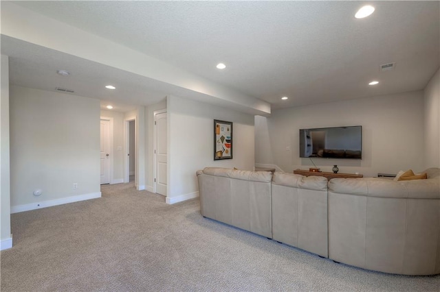 living room with baseboards, visible vents, recessed lighting, and carpet