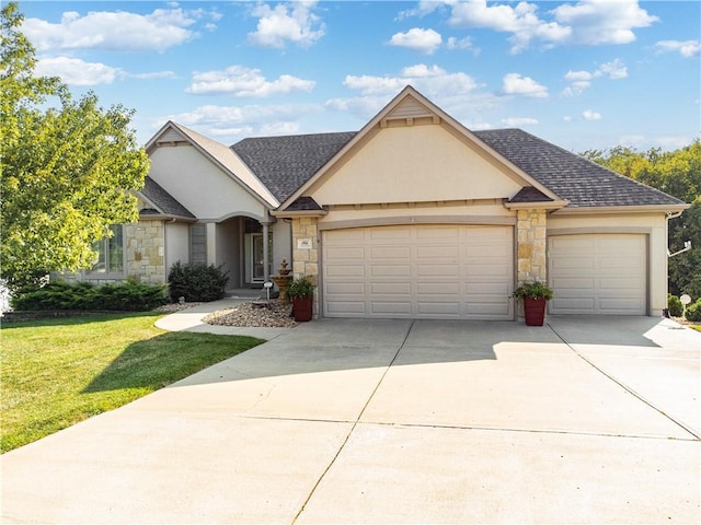 view of front of home featuring driveway, a shingled roof, an attached garage, a front lawn, and stucco siding