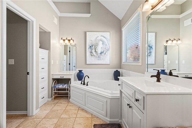 full bathroom featuring lofted ceiling, visible vents, vanity, a bath, and tile patterned floors