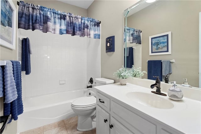 full bathroom with tile patterned flooring, vanity, toilet, and shower / bath combo with shower curtain