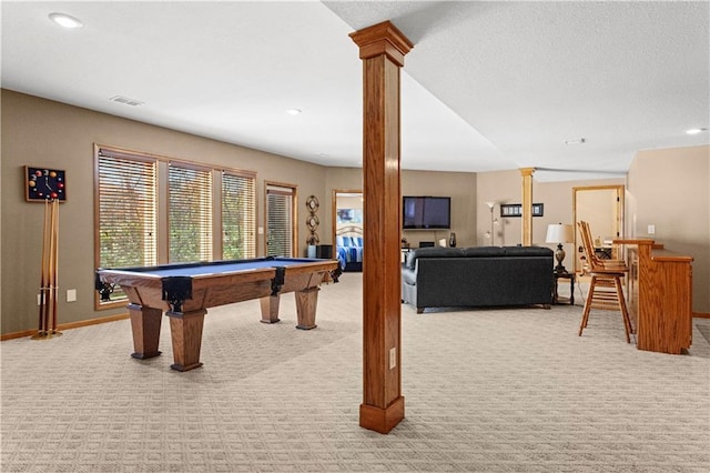 recreation room with recessed lighting, light colored carpet, visible vents, baseboards, and decorative columns