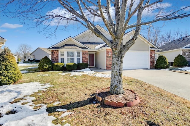 view of front of home featuring a garage and a front lawn