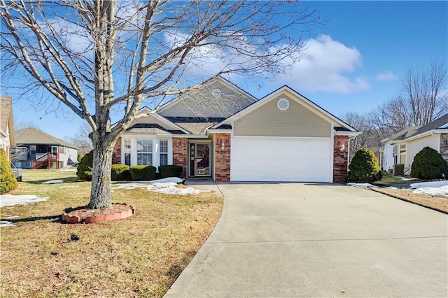 view of front of property featuring a garage and a front yard