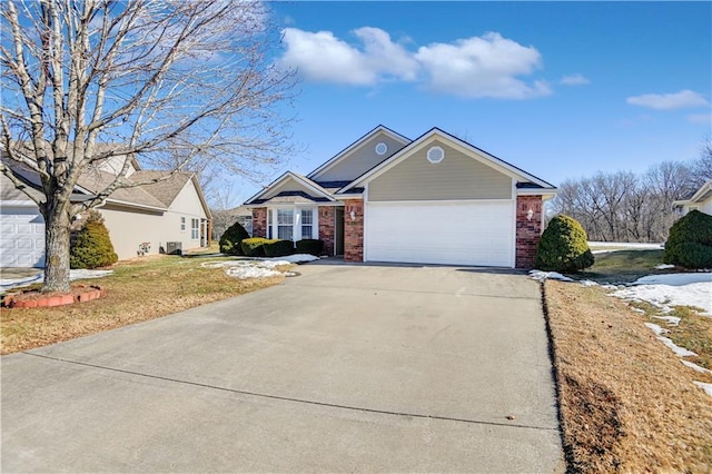 view of front of home featuring a garage and a front yard