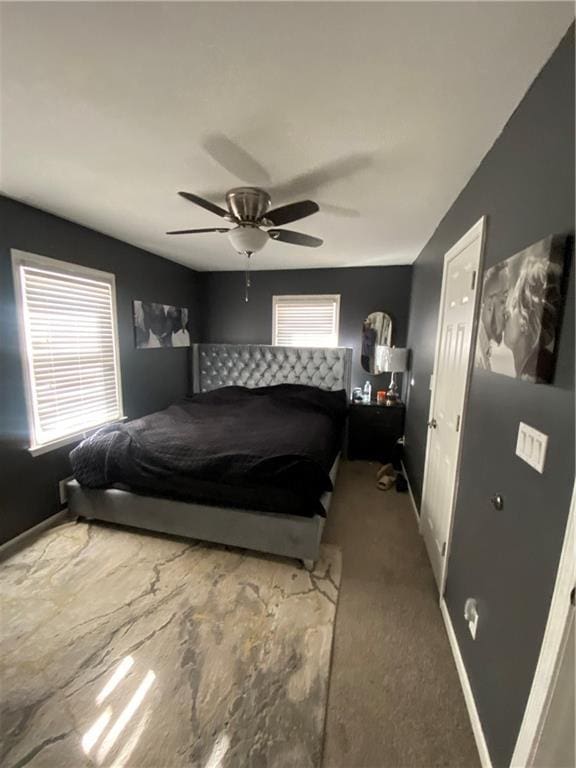 bedroom with carpet floors and ceiling fan