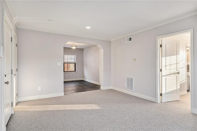 carpeted spare room with ornamental molding