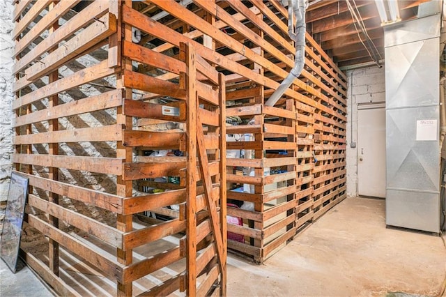1102 W 46th St Unit 3, Kansas City, MO 64111 - wine cellar with unfinished concrete flooring and heating unit