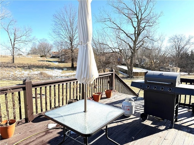 wooden terrace with grilling area