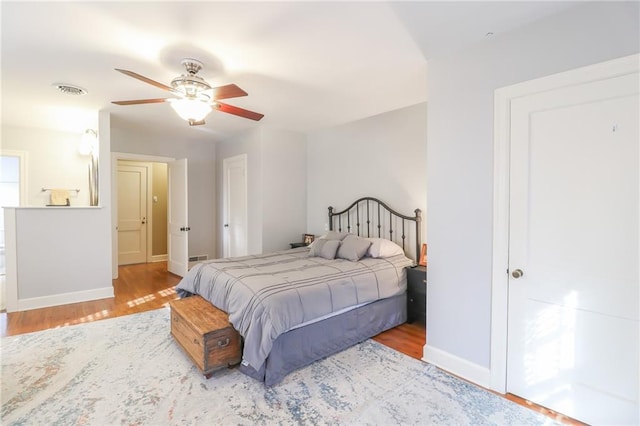 bedroom featuring ceiling fan and light wood-type flooring