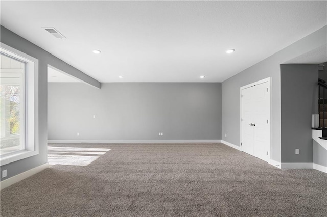 view of carpeted spare room