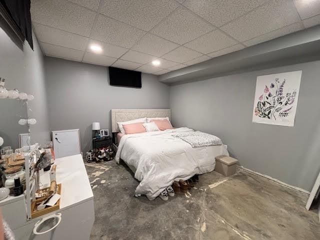 bedroom with a drop ceiling