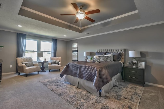 carpeted bedroom with a raised ceiling, crown molding, and ceiling fan