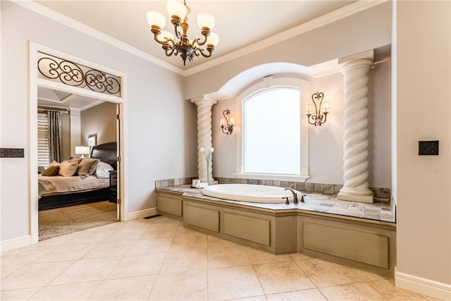 bathroom with an inviting chandelier, decorative columns, tile patterned flooring, a tub, and ornamental molding