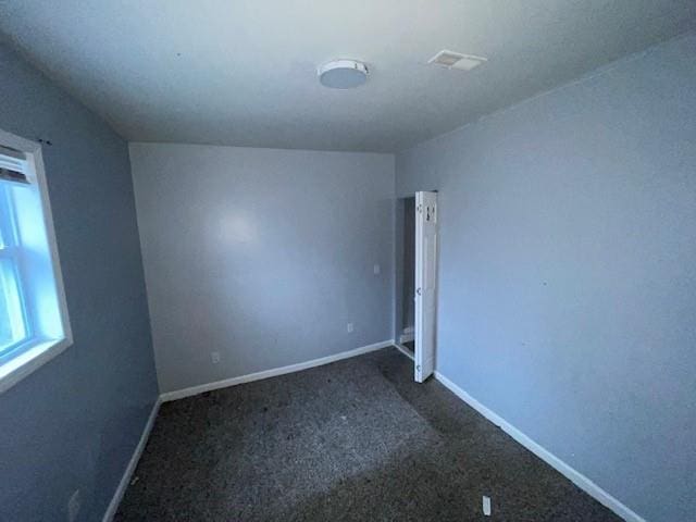 view of carpeted spare room