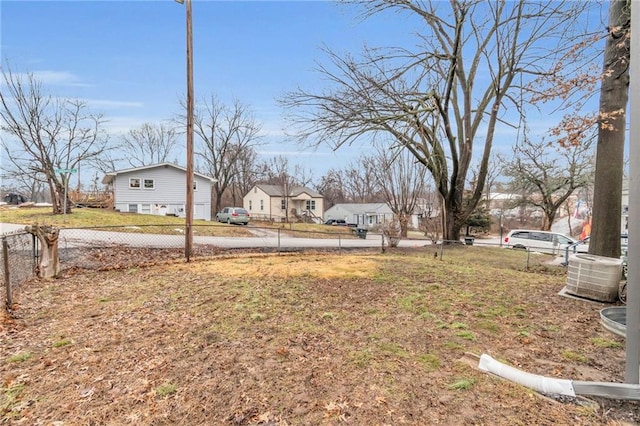 view of yard with central AC unit