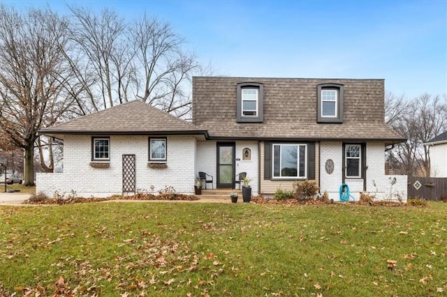 view of front of home featuring a front yard