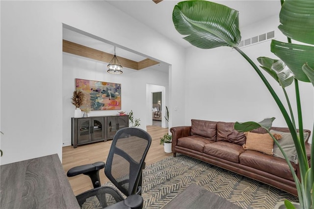 office featuring light wood-style floors and visible vents