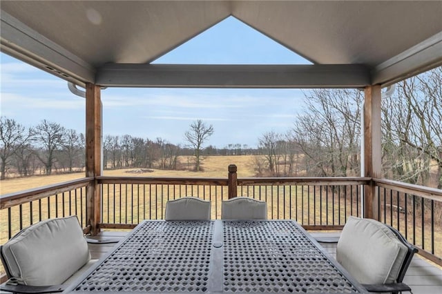 deck featuring outdoor dining area