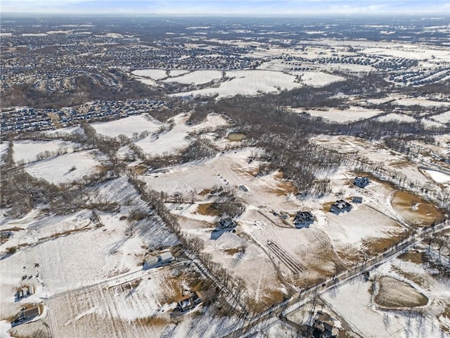 birds eye view of property featuring a desert view