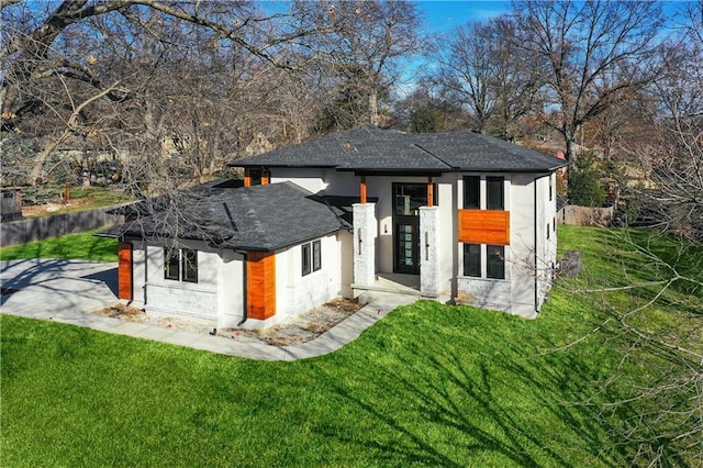 view of outbuilding with a yard