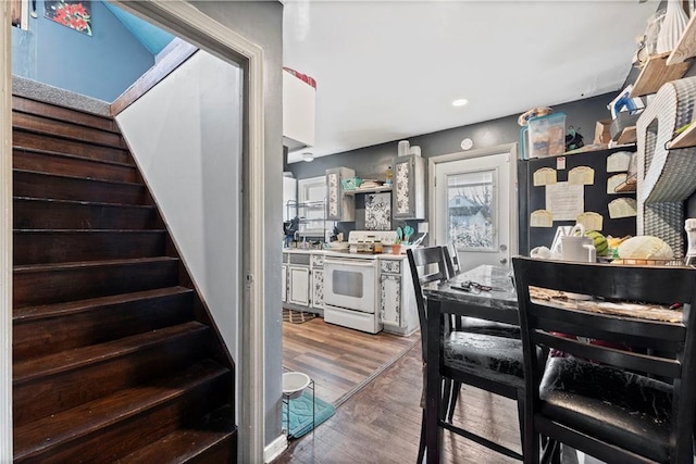 dining area featuring hardwood / wood-style flooring